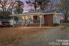 Photo of 208 Tomberlin Road, Mount Holly, NC 28120 (MLS # 4437208)