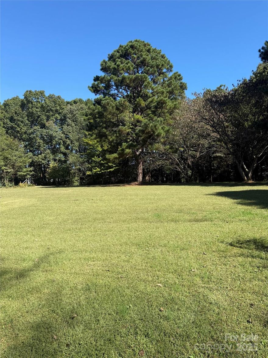 This 4.75-acre property offers the perfect blend of open space and wooded privacy, with roughly 2.5 acres already cleared and ready for your custom build. Enjoy the best of both worlds—peaceful country living just minutes from Mint Hill, Matthews, and convenient I-485 access.
