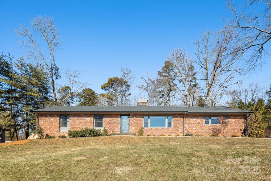 Stunning 4-Bedroom Home in Oak Forest Neighborhood with Modern Upgrades and NO STORM DAMAGE. This spacious 4-bedroom, 3-bathroom residence has been meticulously renovated, offering a perfect blend of modern amenities and timeless charm. Enjoy abundant natural light throughout the open-concept living and dining areas, creating a warm and inviting atmosphere.  Spacious primary bedroom features a renovated on-suite bath for your comfort and large walk in closets.  Step outside to your private backyard retreat, complete with an inground pool—perfect for entertaining or relaxing on warm summer days.  Separate home office, studio, or guest accommodations. Situated close to all things South Asheville, easy access to shopping, dining, parks and schools. Experience the best of both worlds—a tranquil neighborhood setting with urban conveniences.