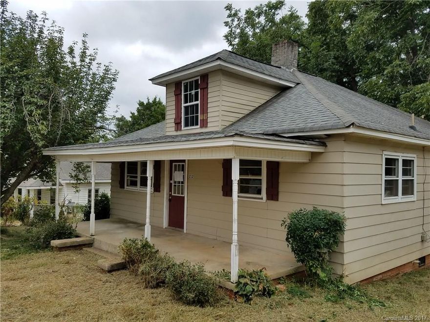 Charming older home with some updates. Neutral colors. Some of the remodeling is unfinished and missing kitchen appliances. Cellar for storage and detached single garage with storage above. Being sold AS IS.