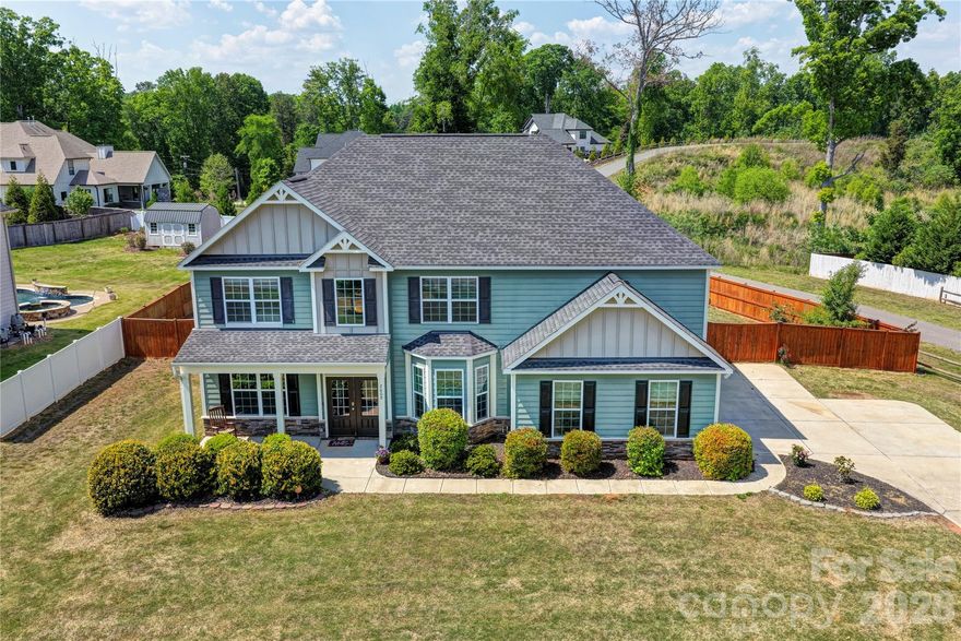 This exceptional 4-bedroom, 3-full-bath home offers a wealth of upgrades and thoughtful features throughout. From the moment you step inside the grand entrance, you are welcomed into a beautifully appointed dining room with an elegant, coffered ceiling, setting the tone for the quality found in every room.

A spacious office or flexible room provides the perfect space for working from home or pursuing hobbies. The main floor also includes a comfortable bedroom and a full bathroom, making it ideal for guests or multi-generational living. The living room seamlessly connects to the bright breakfast area and the modern kitchen, creating an open and inviting atmosphere for daily living and entertaining.

The kitchen is a chef’s delight, featuring a central island, granite countertops, and sleek stainless-steel appliances. Imagine starting your day with a cup of coffee under the covered patio, overlooking a flat backyard adorned with fruit trees and garden spaces. A newly installed 6-foot privacy fence completely encloses the backyard, ensuring a tranquil and private outdoor retreat.

Upstairs, the expansive master bedroom includes a generous sitting area, both spaces enhanced by high tray ceilings that create a grand and airy feel. A cozy loft provides additional living space, while two more bedrooms and a convenient hall bathroom complete the upper level, offering plenty of room for family and guests.

This beautifully upgraded home is has been freshly painted and is truly a must-see. Don’t miss the chance to experience all it has to offer in person!