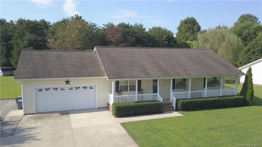 Move in Ready home in desirable West Iredell!! This immaculate 3 bedroom 2 bath ranch is freshly painted and ready for you to make your own. Recent updates include carpet (2016) laminate floors (2016) kitchen floors (2017) newer roof (2011) and water heater (2011). New gravel and 30A hookup for camper to the left of the garage. This one won't last long!!

Seller offering one year America's Preferred Home Warranty!