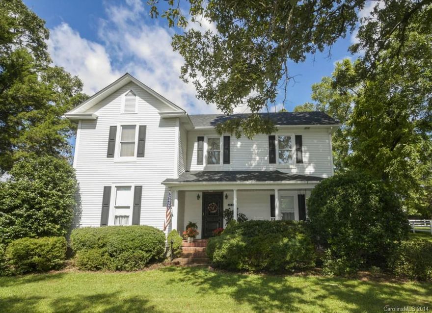 Charming character galore!  Incredible heart of pine floors, beaded board ceilings, in-law suite on main, heavy wood trim, huge eat-in country kitchen w/ keeping room w/ fireplace, fireplace in master suite, tons of storage, 2012 roof, Gunite pool, wired workshop, large arena w/  4-stall barn w hay loft, tack barn, covered trailer shed,  3 separate pastured fences for horses or small animals, and more!