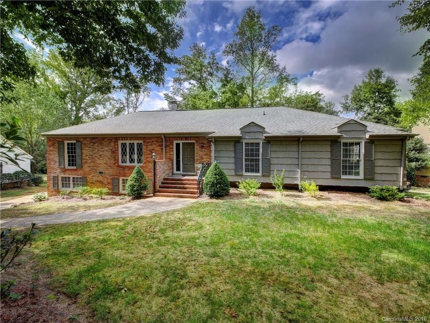 Updated ranch in desirable Mountainbrook.  Kitchen features granite counter tops, tile backsplash, center island and bkf. area.  Family room with fireplace and built-ins.  Huge master suite with separate sitting area. Walk-in closets in every bedroom. Full apartment, office space, study or artist's studio in lower level includes kitchen/breakfast area, 2 BR and 1.5 baths plus separate entrance. 2 car carport with storage.  Huge terrace.