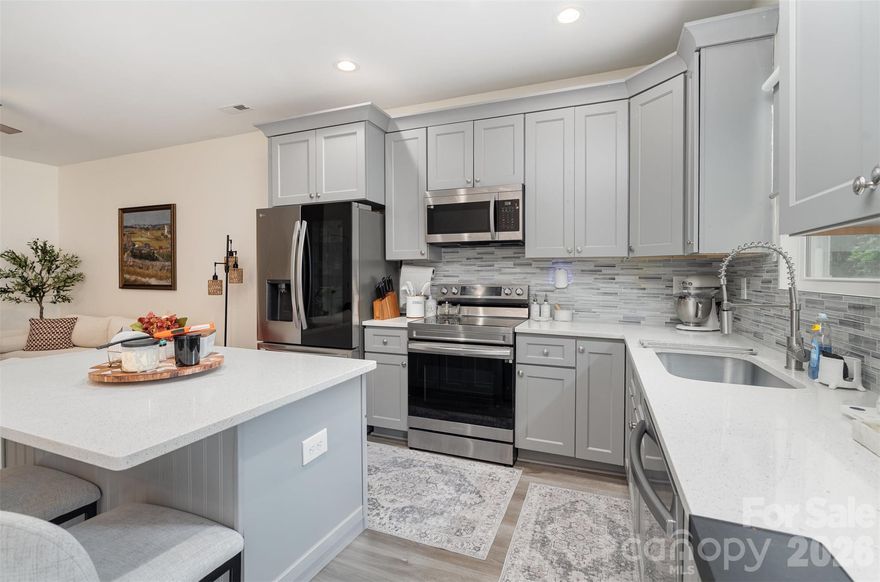 Seller offering $4,000 in credits for rate buy down, and preferred lender offering an additional $2,000 in credits. Home also qualifies for the "NC 1st Home Advantage Down Payment" program, which provides up to $15,000 in down payment assistance for eligible buyers.

Minutes from downtown Kannapolis and all it has to offer, new baseball field, downtown revitalization with great shopping and dining options; easy access to I-85. This new home with great modern finishes offers 3-bedrooms, 2.5 baths. Upstairs, the primary suite includes a walk-in closet and a roomy en-suite bath with Dual Vanity. Home is well maintained with beautiful floors, soft close cabinets, quarts counter tops, stainless steel appliances, beautifully tiled bathrooms, Open floor plan, laundry on 2nd level, garage and a back yard.