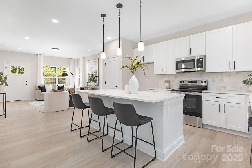 Move in Ready Packages now included - 6’ privacy fence, all appliances & blinds. Builder/Lender offering 2-1 Rate Buy Down (rates in the 4's). Also qualifies for 100% financing and $20,000 in closing costs. MUST SEE UPGRADES! Stunning new construction 5 bedroom single family home located in an established subdivision. Open floorplan featuring 9 foot ceilings on both levels and luxurious finishes such as quartz countertops, white shaker cabinetry with 42" uppers, soft close doors & dovetail drawers, subway tiled backsplash and designer tile in both primary and guest baths. Turnkey move in ready home perfect for first time buyers and investors. Loaded with upgrades including luxury vinyl plank flooring throughout, Pella windows & doors, fiber cement siding, stainless steel appliance package, black hardware & Moen plumbing fixtures. Primary suite offers ensuite bath with shower & dual vanity. Complete with a dedicated home office on main, 2 car garage, rear patio & flat yard.