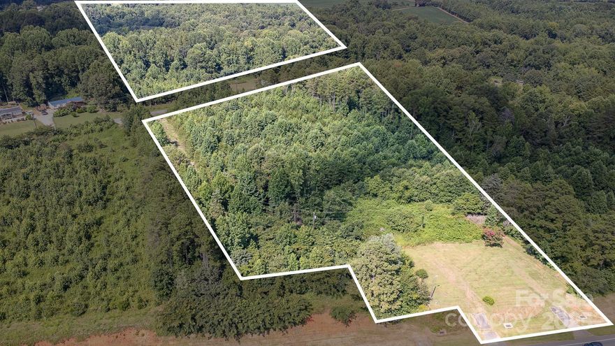 Located just off US Old Hwy 70, this unique 7-acre property offers a versatile opportunity for builders, investors, or those looking for privacy and space. With approximately 4 acres on one side of the road and 3 acres on the other, this parcel can remain whole or be divided into two separate buildable lots—each with its own potential home site. Enjoy easy access to main roads while still having the flexibility to create multiple living spaces or a personal retreat with room to spread out!
