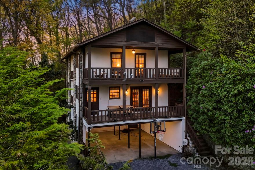 Appalachian living, elevated. Welcome to this fully furnished 3-bedroom, 4-bathroom mountain retreat set on 3.3 private acres in the heart of the Blue Ridge Mountains. Thoughtfully designed across three levels, the home offers a seamless blend of comfort and functionality, with expansive living and recreation spaces centered around two striking stone fireplaces—ideal for both relaxing and entertaining.
Take in breathtaking long-range mountain views from two private balconies, perfect for morning coffee or unwinding at sunset. The recently updated kitchen features modern appliances and flows effortlessly into the main living areas. Offered fully furnished with STR-ready pieces, this home is truly turnkey.
Currently operating as a successful short-term rental, this property is STR-approved and well-positioned for continued income potential—making it an exceptional opportunity for both investors and second-home buyers.
Located just minutes from the Blue Ridge Parkway, Lake Junaluska, and approximately 40 minutes from Asheville, you’ll enjoy the perfect balance of privacy, natural beauty, and accessibility.
This is more than just a home—it’s a rare opportunity to own a piece of the mountains, where lifestyle and investment align.