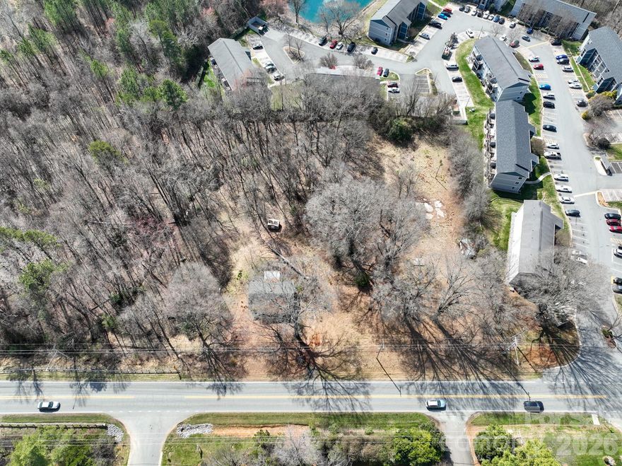 Development opportunity located along one of Concord’s primary corridors with over 400 ft of road frontage! 28027 has an above trend growth for a suburban market and sustained demand for residential & mixed use. Currently zoned RM-2, this property presents strong potential for redevelopment subject to rezoning & sewer approval. Positioned on Davidson Highway with convenient access to major roadways, retail, and surrounding residential growth, the parcel offers flexibility for future development. Potential uses may include multi-family, townhomes or office pending rezoning and municipal approval. Ideal for investors, builders, or developers seeking to capitalize on continued growth in Cabarrus County. Existing structure conveys as-is at no value while pursuing entitlement or redevelopment plans. Property includes 2 parcels -PIN#56115633580000, PIN#56115632410000! Home located on property is not habitable, not accessible for showings!