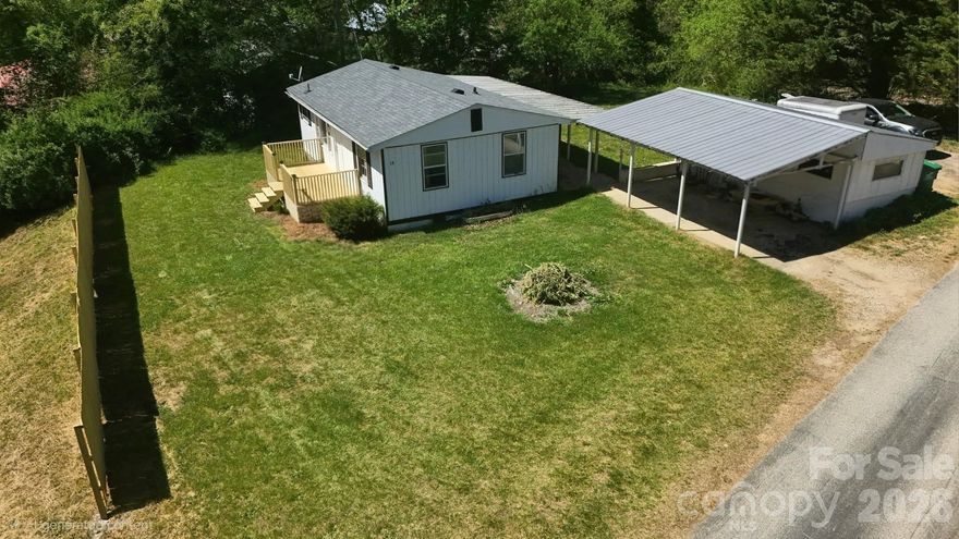 Mountain Simplicity Minutes from Everything Asheville Has to Offer
Tucked into the quiet community of Leicester, this cozy 2-bedroom, 1-bath home delivers the WNC lifestyle without the Asheville price tag. Sitting on a level, usable lot, the property gives you the flat yard you've been searching for, whether that means a garden, firepit hangout, or just room to breathe.
This house features a spacious workshop ready for your tools, hobbies, or weekend projects. A covered carport keeps your vehicle protected year-round. Inside, the layout is efficient and comfortable, everything you need, nothing wasted.
Step outside the neighborhood and you're minutes from Noble Cider's taproom on New Leicester Highway, the trails at Lake Powhatan and Bent Creek, and the French Broad River. Downtown Asheville's restaurants, breweries, River Arts District, and live music are just 11 miles away, about a 15-minute drive. Mission Hospital is right in that same corridor, making this location as practical as it is scenic.
Whether you're a first-time buyer, a hobbyist craving a serious workspace, or someone looking to plant roots near Asheville without paying Asheville prices, this one is worth a look. Schedule your showing today.