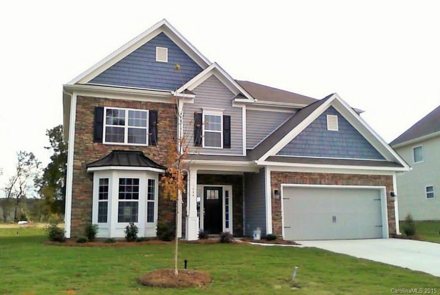 Spectacular 2 story home with spacious bedrooms and oversized bonus room. Floor to ceiling elegance, exquisite trim detail, extensive hardwoods, stainless appliances, fireplace, granite countertops and tile floors in bathrooms... This gorgeous home is completed and move in ready; hurry in, this home wont last long!