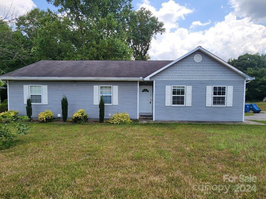 Welcome to 705 Bounous Street in Valdese, a charming one-level home built in 2007, conveniently located close to downtown with restaurants and shopping. This inviting residence features three bedrooms and two full baths. Sunroom, eat-in dining area and well-appointed kitchen, boasting ample cabinets and counter space. Step outside onto the large, partially covered deck, ideal for entertaining guests or simply enjoying the outdoors. Additionally, the home includes a 193 square ft unfinished basement accessible from the exterior, providing excellent storage. Please note, the property is being sold "as-is," and the buyer will be responsible for removing all personal property. Don't miss this opportunity to own this lovely home!