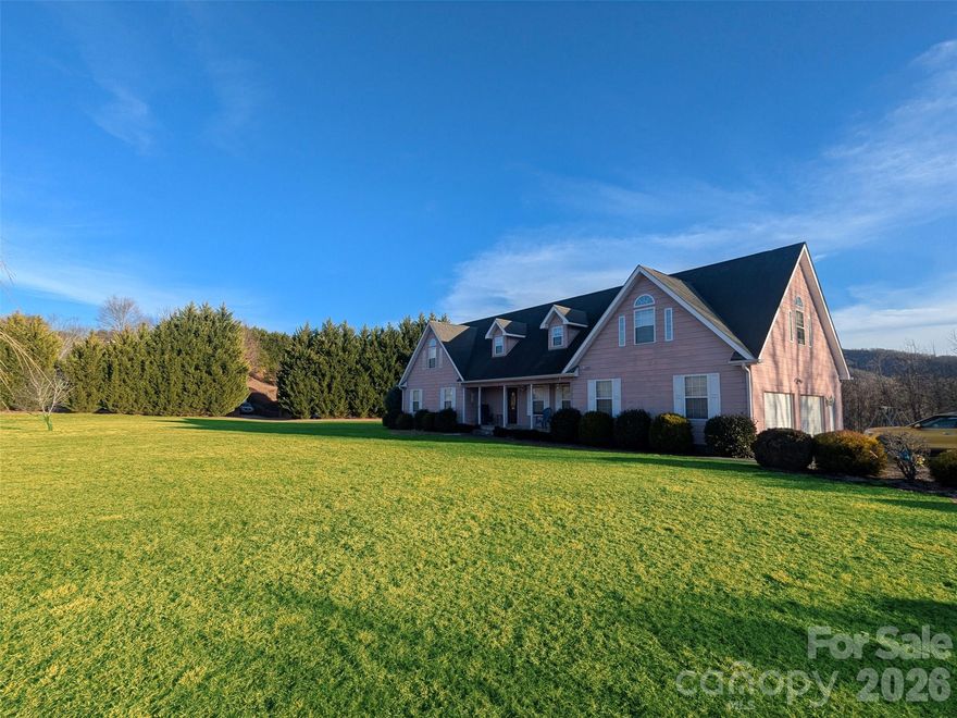 See comments below about the amazing seller credits being offered!  Spacious inside and out, this warm and inviting 2,986 square foot country home offers breathtaking year round long range mountain and pastoral views from the sun filled, south facing patio, along with coveted, perfectly flat land that is increasingly hard to find.  Perfectly suited for a large family or a flexible work from home lifestyle, the thoughtfully designed layout includes four generously sized bedrooms and three full baths. The primary suite on the main level features a large walk in closet and a relaxing whirlpool spa tub, creating a private retreat at the end of the day, while a second bedroom and full guest bath on the first floor add convenience and versatility.  Upstairs, you will find two expansive bedrooms enhanced by stylish dormer windows, along with a full bath and an extra large family room that also functions beautifully as a media room or spacious office suite. Situated on an oversized, flat corner lot that adjoins pastureland at the rear of the property, this home provides both privacy and sweeping open views.  Seller is offering a complete exterior painting escrow allowance of $15,470, which includes all woodwork repair to trim and fascia.  Although the roof has no leaks and is in relatively good condition, there are some missing shingles and granular loss on the back slope so the sellers are offering a complete reroofing escrow of $21,500.  These two escrows, totaling at $36,500 can be taken either as a repair escrow if you would like to receive a freshly painted house with a new roof at closing, or as a closing cost credit or price reduction if you wish to paint the house and handle roof repairs on your own.  This is an unbeatable deal!!  Call to schedule a showing and let's make this your place!!