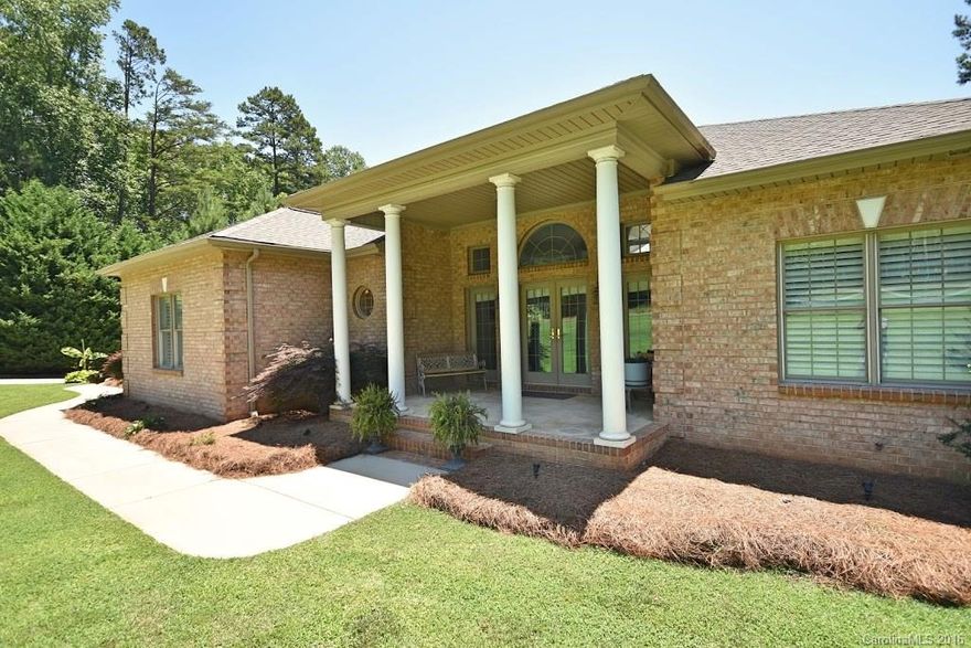 WATERFRONT all brick Ranch w/basement is just what you've been waiting for! Very rare to have TWO docks and a  boat ramp which are "grandfathered in". Large .9 acre lot has deep water and room for a pool.  Expansive, partially covered, composite wood deck for outdoor relaxation. Open floorplan, granite tops, stainless appliances, hardwood flooring in living areas, central vac, water filtration system. Roof new in 2013. Lower level could be 2nd living quarters,  has a screen porch. Home Warranty.