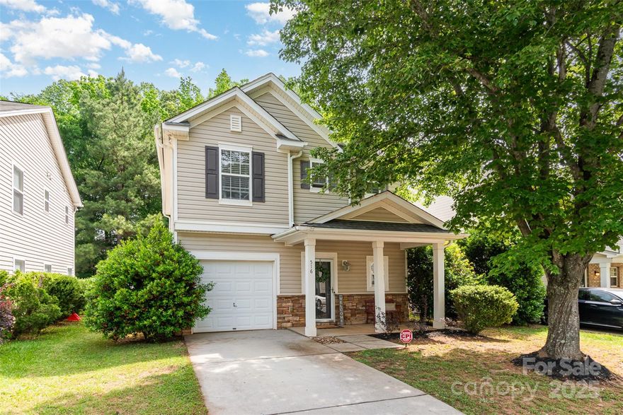 Charming home ideally located near the Whitewater Center and CLT Airport. You'll love the beautiful wide plank floors and tile that grace the main level. The high ceilings create an open and airy atmosphere throughout. The kitchen offers plenty of storage and counter space. Upstairs, you will find all three bedrooms. The spacious primary bedroom features a trey ceiling, an attached ensuite, and custom shelving in the walk-in closet. The two additional bedrooms share the second full bath. The oversized back patio is perfect for entertaining, and the flat fenced backyard benefits from a scenic wooded backdrop.