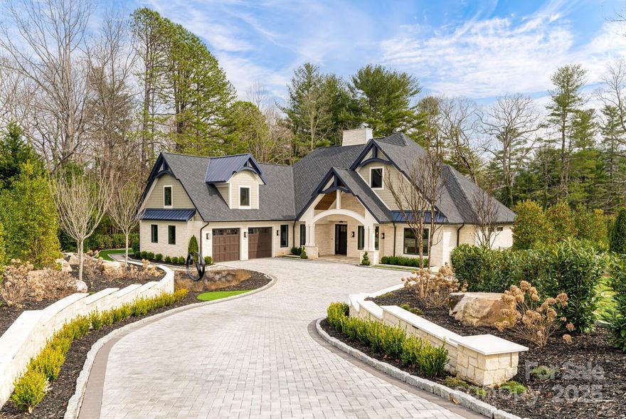 Exquisite Living Experience in the coveted, gated community of Berwick Downs delivering uncompromising quality, architectural flair, artfully planned landscaping and amazing resort-style amenities. Main level boasts great room w/gas fireplace flanked by bookcases, chef’s kitchen w/ island, high-end appliances and walk-in pantry blending seamlessly with the chic dining room and great room, spa-like primary wing features walk-in closet, dual vanities, walk-in shower, soaking tub w/ views to the private outdoor shower area w/waterfalls, 3 guest ensuite bedrooms and fabulous laundry room. The upper level features a family room w/walk-in storage, office and 2nd primary suite. Enjoy outdoor resort style luxury living at its finest while dining on the covered patio, sitting around the firepit or relaxing in the spa or swimming in the amazing pool with Turkish Travertine decking featuring 5 waterfalls. No grass to cut- high quality artificial turf. The ultimate in privacy and serenity!