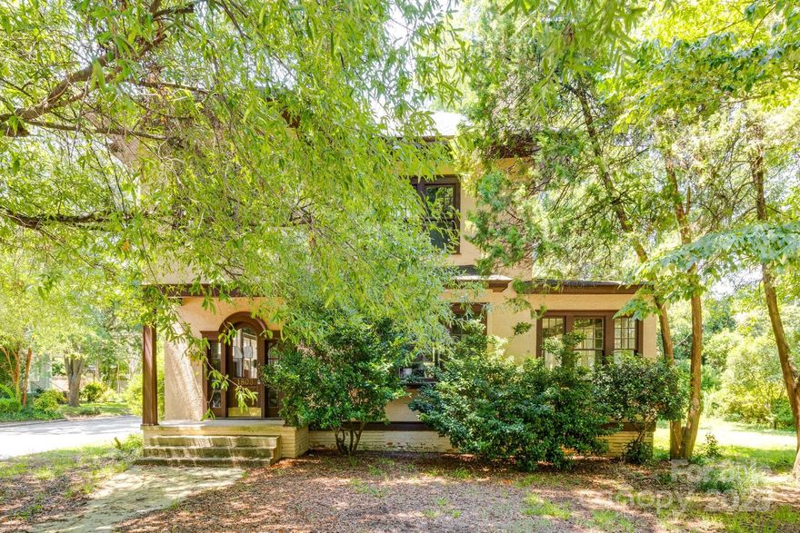 Here's your unique opportunity to create your dream home in the highly sought-after Wales Garden Historic District. Known for it's beautiful tree-lined streets, historic architecture and strong sense of community, this home provides endless potential in one of Columbia's most desirable neighborhoods. Enjoy a short bike ride to downtown Columbia or discover the charm of Five Points,  Columbia’s vibrant neighborhood full of great food, live music, and unique shops! This historic 1927 home has been stripped down to the studs, offering a rare and exciting opportunity to completely customize your dream home. Sitting on a large corner lot with mature trees and landscaping, the property provides ample space and privacy. This versitile floorplan offers living room, dining room, sunroom, 3 bedrooms on the second floor and a bonus room in the attic.  Buyers may qualify for Bailey Bill tax incentive. Bring your vision!