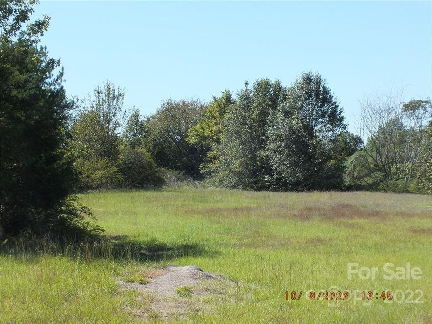 Commercial land at the corner of South Main St and Hwy 200 Bypass, road frontage on Hwy 200 Bypass and Kershaw Camden Hwy, corner lot, busy intersection on 4 lane, build your business, property has public water and sewer. This includes 3 different lots that can be joined together for a total of approximately 3.14 acre (+-)