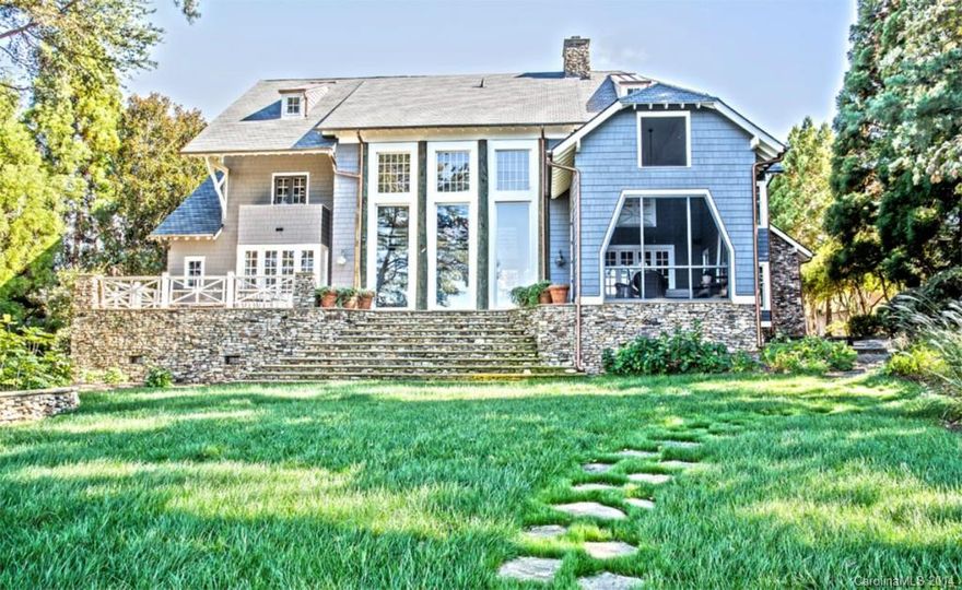Beautiful Open floor plan with breathtaking views of Lake Norman.  This exceptionally designed home features architectural details and natural materials unlike any other.  Wood and ceramic floors and a floor to ceiling stone fireplace.  New dock has the details of the home.  3rd floor is the 2nd living quarters over the garage connected to the house and also having a separate entrance.  Large walk up attic space that could be finished for extra living space.   This you must see to appreciate.