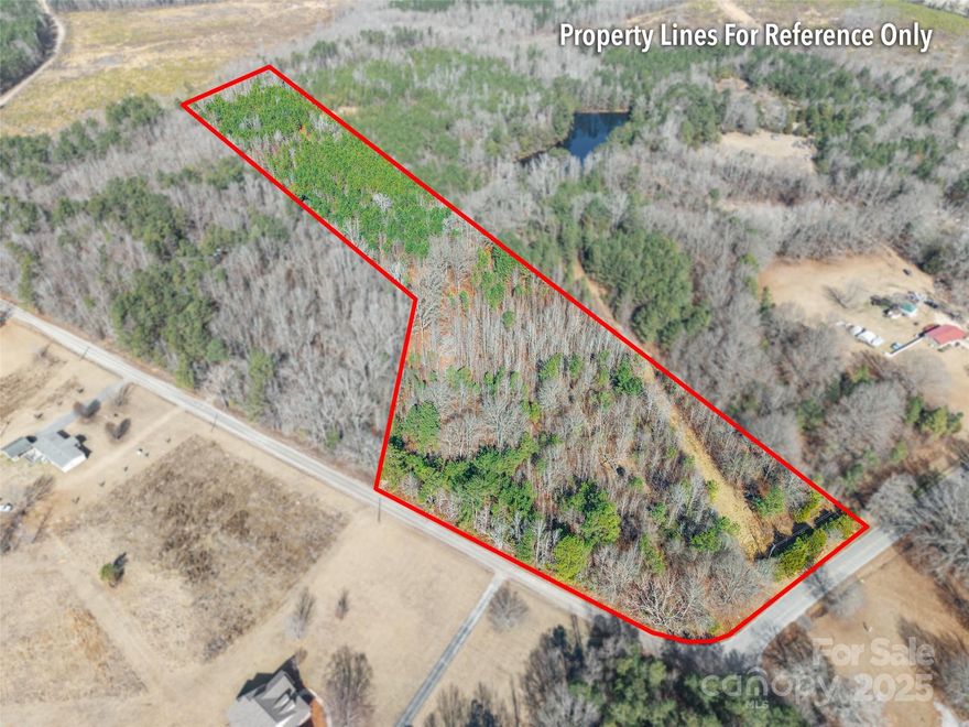 Discover the endless possibilities with this 13.79-acre parcel of land. Zoned Rural Residential (RR), it permits mobile, modular, and stick-built homes. Perc test completed. This corner lot offers access on either Fairhill or Palomino Road. Whether you’re building a private retreat, starting a hobby farm, or investing, this property offers the perfect foundation for your vision! A septic system needs to be installed by buyer, and county water is available - buyer to pay the tap fee.