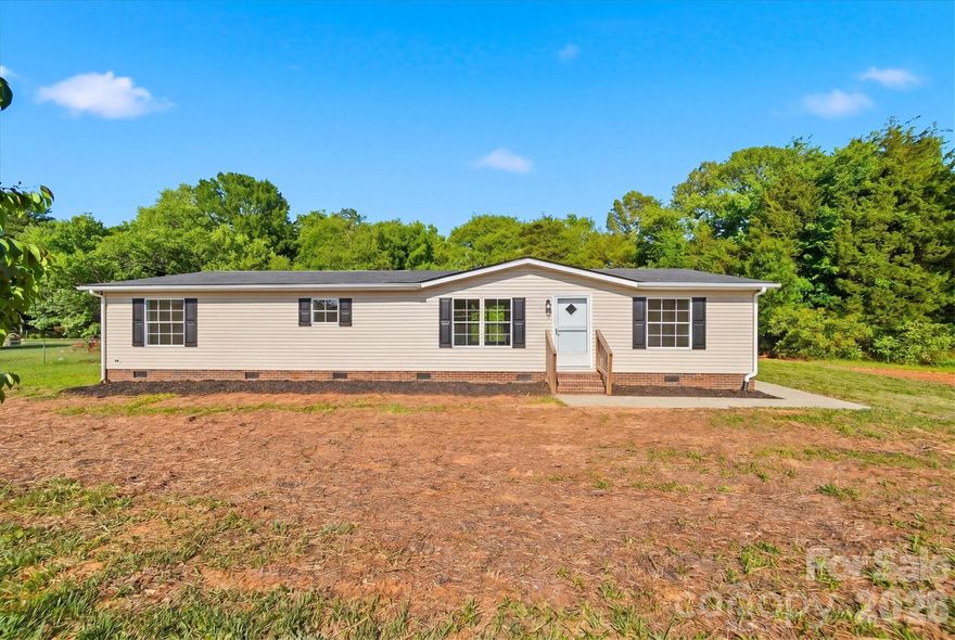 Welcome to this beautifully updated 3-bedroom, 2-bath home offering over 1,500 square feet of stylish living space on a spacious half-acre lot. Completely renovated, this move-in-ready home features a new architectural shingle roof, updated flooring, fresh paint, modern fixtures, and a stunning kitchen with white shaker cabinets, granite countertops, and stainless steel appliances.

Enjoy outdoor living with a large rear deck overlooking the fully fenced backyard- perfect for entertaining, pets, or relaxing evenings at home.

Offering the perfect balance of peaceful country living and everyday convenience, this property is ideally located near Statesville, Taylorsville, and major highways for an easy commute.

Don’t miss your opportunity to own this beautifully renovated home with modern updates, outdoor space, and a prime location! Schedule your showing today!