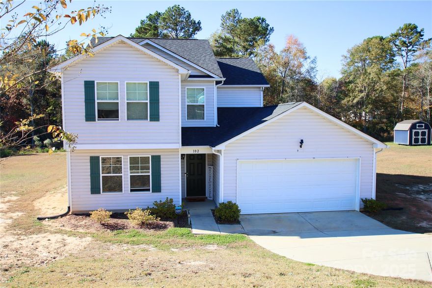 Welcome to this spacious 4-bedroom, 3-bath home on a large half-acre lot. The first floor offers a versatile flex room, a comfortable family room, and a bright kitchen with a center island. A full bath, laundry room, storage area, and mud room add convenience and functionality. Upstairs, you'll find three generous secondary bedrooms and a shared hall bath. The primary suite features its own ensuite bathroom and a roomy walk-in closet. Outside, enjoy an expansive yard with plenty of space for outdoor living. This well-designed home offers comfort, flexibility, and room to grow.