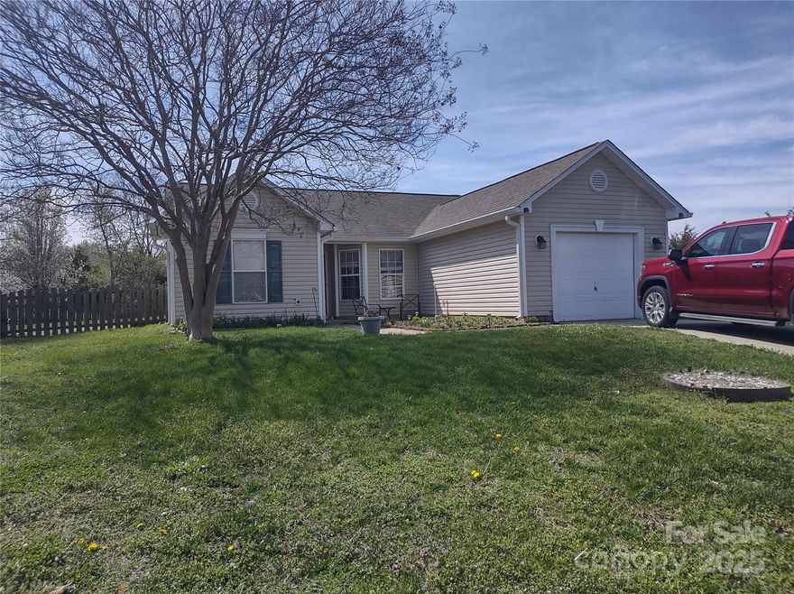 Gardener's dream house! Cute split floor plan with 3 Beds, 2 Baths, 1211 sq ft, over 1/4 acre lot, fenced back yard, with raised beds in place. Plenty of sun in the backyard for your garden. Primary bedroom suite will fit a King sized bed and has an updated en suite bathroom with walk in shower and walk-in closet. Secondary bedrooms are on the other side of this floor plan and are large enough for a queen sized bed, or maybe to be an office. Major mechanicals as well as roof are less than 10 years old. The eat-in kitchen has Granite countertops, and stainless steel appliances and is connected to the living room in a very open design. Refrigerator conveys with acceptable offer.