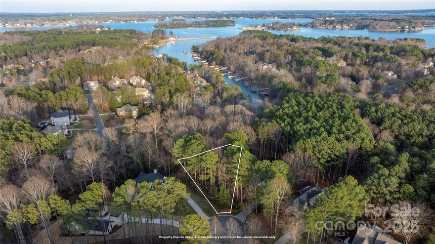 Prime Sailview Lot with Deeded Community Boat Slip – Lot #464 Ash Hollow Lane. Build your dream home on Lot #464 Ash Hollow Lane, a rare opportunity in one of Denver’s most sought-after communities! This spacious lot offers the perfect blend of privacy, natural beauty, and convenience—all just minutes from Lake Norman and the vibrant amenities of the area. A standout feature of this property is its deeded boat slip (#78) at the community docks, providing effortless access to Lake Norman for boating, fishing, and waterfront fun. Whether you're a lake enthusiast or love the idea of having your own private access to the water, this is a game-changer!
