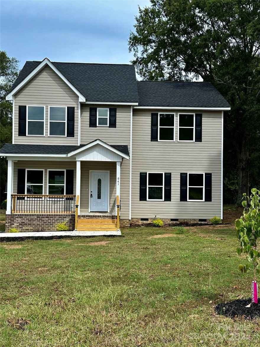 Brand New Home sitting on over half an acre with Close proximity to Monroe bypass, schools, grocery and shopping. Up to 5 bedroom configuration or use 5th bedroom as bonus flex room/office. Primary bedroom suite on main floor with large walk in closet. Beautiful finishes throughout home with an open concept Kitchen decked out in golden trim and hardware to give that ultimate timeless appeal. The Stunning countertops and backsplash combo really sets the kitchen and dining area off. All rooms upstairs are ample sized and well appointed. Large backyard with room to play and country views in the front yard where you can watch the horses roam from your front porch. This is a great home in the amazing and growing town of Marshville.