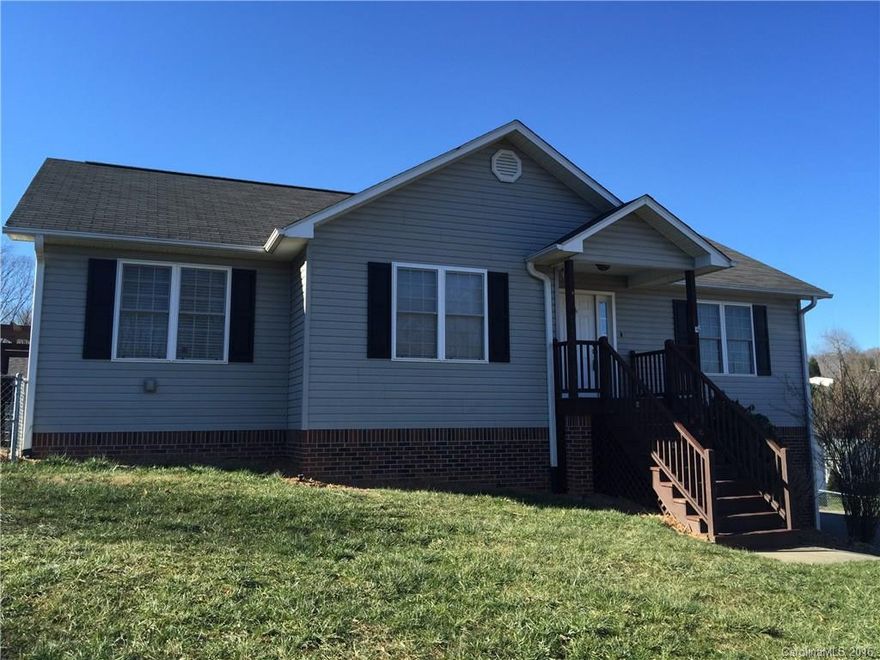 Motivated! Great location! Move in ready. 3BD/2BA comfortable spacious home. Updated kitchen with Granite and beautiful hardwoods, gas fireplace, open floor-plan with master on main,  fenced back yard and mountain views! Close to I40 and 15 minutes from Asheville.