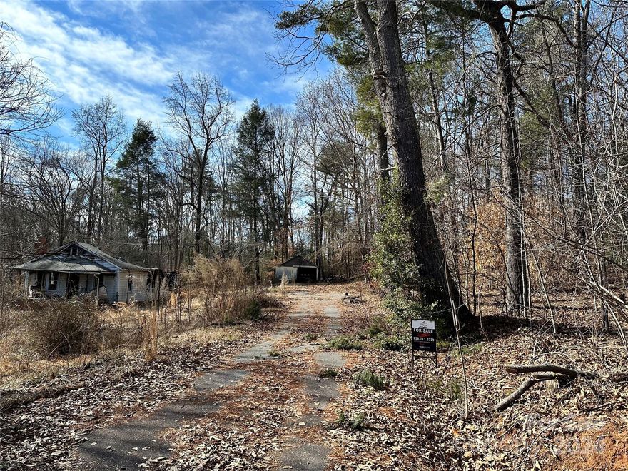 Discover the potential of this unique 5.04-acre parcel nestled in the charming surroundings of Morganton, North Carolina. Boasting a mix of open land and wooded areas, this expansive property offers a canvas for your imagination. The partially burned home on-site presents an opportunity for renovation or reconstruction, allowing you to create the home of your dreams in this serene setting. Explore the possibilities of developing the land for various purposes, whether it be a residential home, vacation retreat, or investment opportunity.