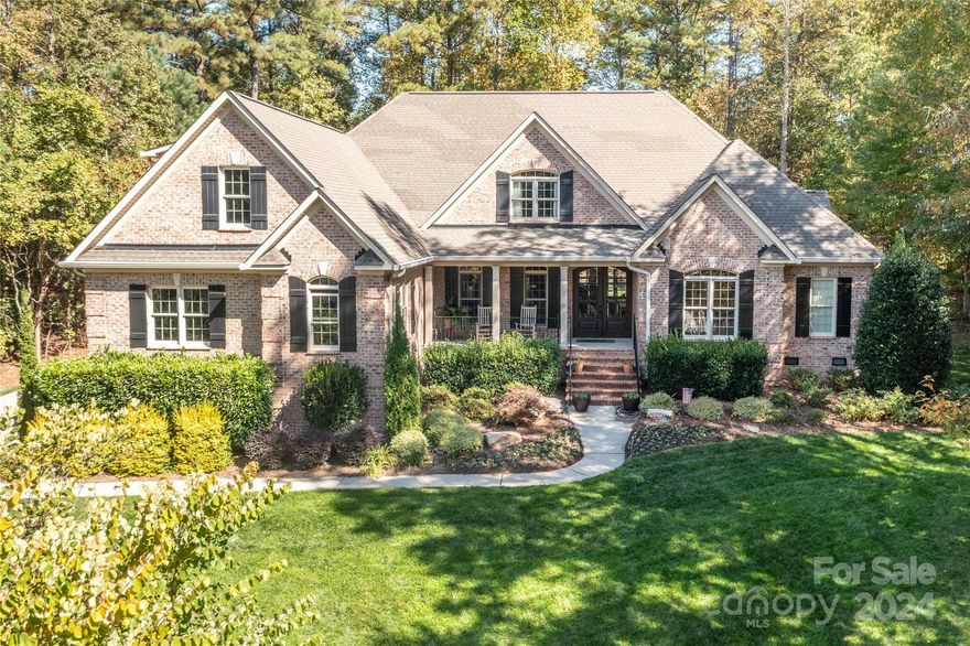 Located in a most desirable lake front community, find this all brick custom gem featuring over 4000 sq ft of luxury appointments to welcome you home. Just off the formal entry foyer is a large dining room, with a walk-through Butler’s Pantry to the oversized gourmet kitchen. The kitchen provides an island, along with eat in area and bay window. Adjacent to the kitchen is a keeping room with stone fireplace, gas logs and cathedral ceiling. The family room boasts a coffered ceiling, stone fireplace, and large windows offering a full view of a secluded and private back yard with patio and fire pit, with room for that pool you may be thinking about. Featuring  two bedrooms on the main level with the primary bedroom offering a tray ceiling, and massive on-suite bath with walk in closet. Upstairs are 2 more bedrooms with on suite full baths, a loft office area, a large bonus room, and over 500 sq ft of walk out storage space. 
Don't miss out on the opportunity to own this gem!