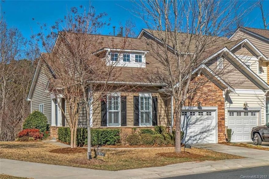 Immaculate, end unit, townhome on the Tega Cay Peninsula. Completely upgraded with touches of craftsman charm. Open floor plan with hardwood floors throughout main level. Fully updated kitchen & bathrooms, complete with granite counter tops. 3 bedrooms & 3 full baths, plus additional finished room on the lower level, potential 4th bedroom, study/office or bonus room! Master bedroom on main level. Outdoor entertaining space available on the extended, over sized deck overlooking the wooded lot.