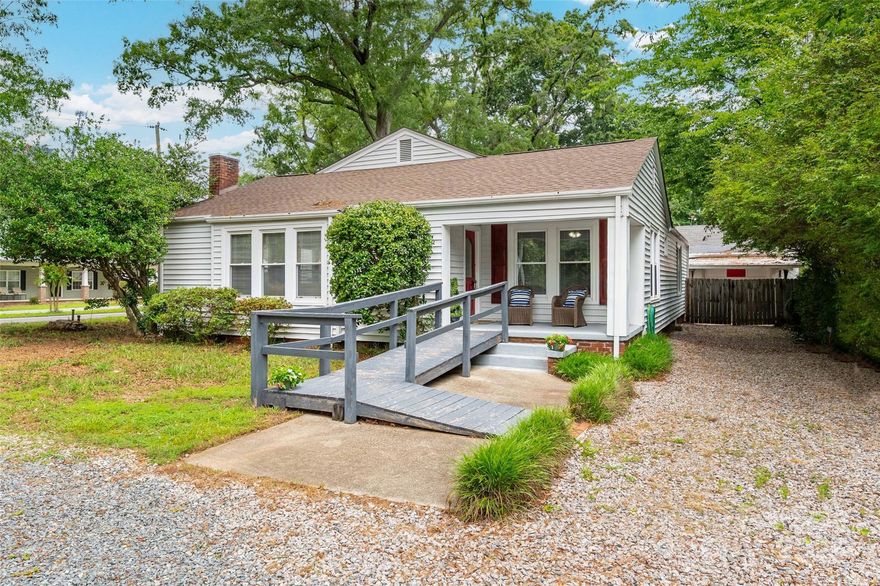 Step into timeless charm with this classic, vintage bungalow nestled on a large corner lot.  Inside you will find spacious bedrooms in a desirable split- bedroom floorplan, offering comfort, privacy and an abundance of space with 1,868 sq. ft. The home showcases vintage character with original hardwood floors and beadboard detailing, while also featuring modern updates like an updated primary bathroom, and a large, updated kitchen with a pantry. 
Enjoy peaceful living with no HOA and a fully fenced, private backyard. The screened porch and cobblestone patio invites you to savor the outdoors year-round.  The detached garage is wired (including 220 power) and plumbed and includes a workshop area ideal for hobbyist or storage. Don't miss this rare gem combining vintage appeal, modern convenience and an ideal location close to Concord, Kannapolis, UNCC and the speedway. Upgrades: crawlspace work 2025, HVAC 2022, water heater 2024, roof & carport top 2017, water softener 2017.
