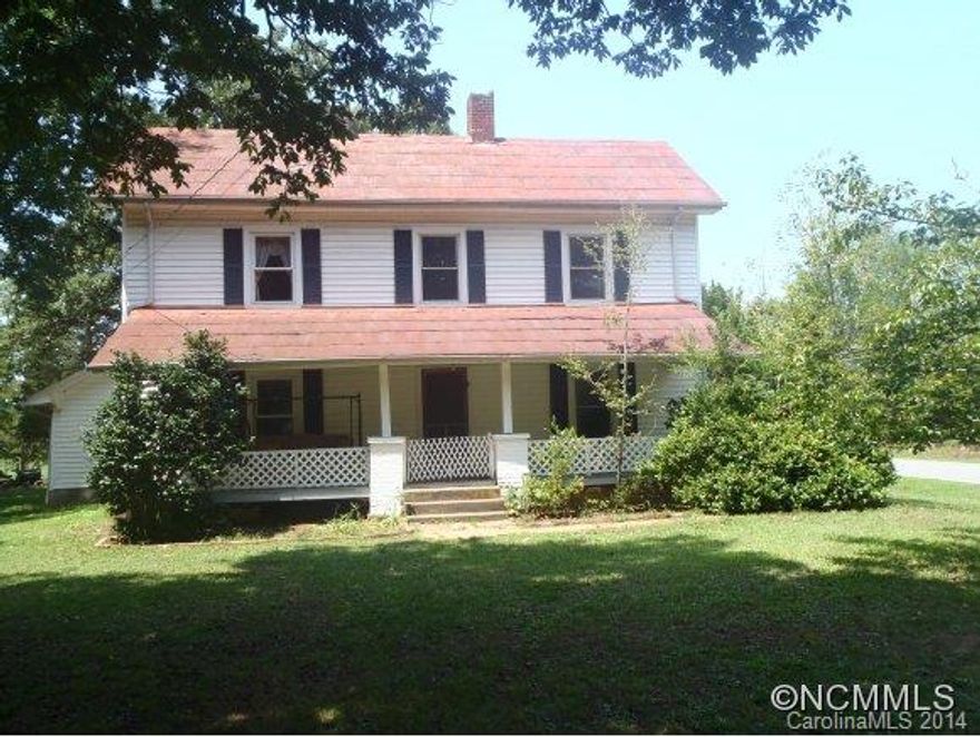 Charming historical farmhouse w/ 5+ acres. Ideal for a mini farm or Sustainable living. Organic Garden area, fruit orchard. Several outbuildings & fenced in areas. Home is on city water but well still provides ample water for garden & animals. Home has been updated with HV/AC system. Plumbing & Wiring updated, new insulation added in the attic, new windows. Home has a septic operations permit for 3 BR however home could potentially be a 5 BR.