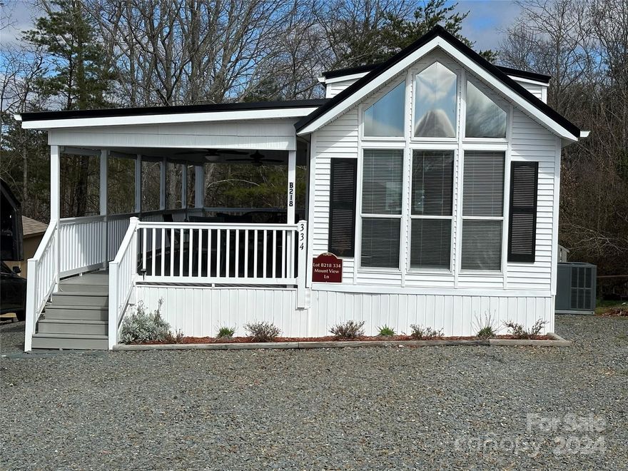 Welcome to your dream getaway at Badin Shores Resort, where luxury meets leisure! Nestled on a level lot, this immaculate park model home offers the perfect blend of comfort and style. As you enter, be captivated by the seamless design that maximizes both space and functionality. The main floor features a cozy yet spacious bedroom, while the loft above serves as a versatile area, ideal for either additional sleeping quarters or as a storage haven. Large windows adorn the home, bathing almost every room in a warm glow of natural light. Parking is a breeze with an abundant space for cars, boats, and even golf carts – ensuring that your every adventure is just a step away. Indulge in the resort's extensive amenities, including a waterfront boardwalk, newly constructed fishing pier, stocked fishing pond, putt-putt golf, swimming pool, horse shoe pits , playgrounds, community boat ramp, and a community clubhouse. Badin Shores Resort invites you to embrace the art of lakeside living.