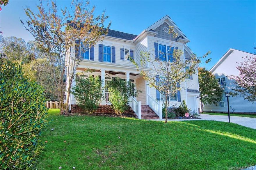 Spectacular custom home w upgrades galore! Three levels of living. Ceiling fans, crown molding, recessed lighting.  New HVAC February '16. 2 tankless water heaters. 6 bedrooms/5 full baths. Guest suite on main w handicapped access bath. Plantation shutters. Kitchen w granite counters, ss appliances, touch faucet & 42" custom cherry cabinets, wide plank wood floors. Custom stone fireplace & mantel in great room. 2 irrigation systems w rain sensors. Tega Cay vacation lifestyle! Fort Mill Schools.