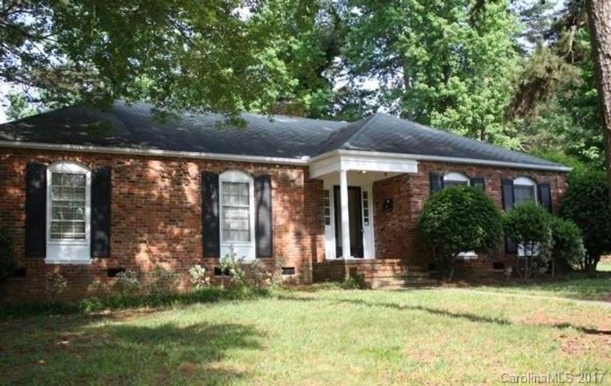 Wonderful Brick Ranch home minutes from Southpark. This lovely home sits on a large corner lot a short walk from the community swim club (memberships available) and ample dining, grocery and shopping.  Hardwoods throughout and a great yard to play in round out the home.  Home schools are Sharon, Alexander Graham and Myers Park!  This 3 bed/ 2 bath home features 2 living spaces, a wood burning chimney, eat-in kitchen and en suite master bath.   Take a look today!