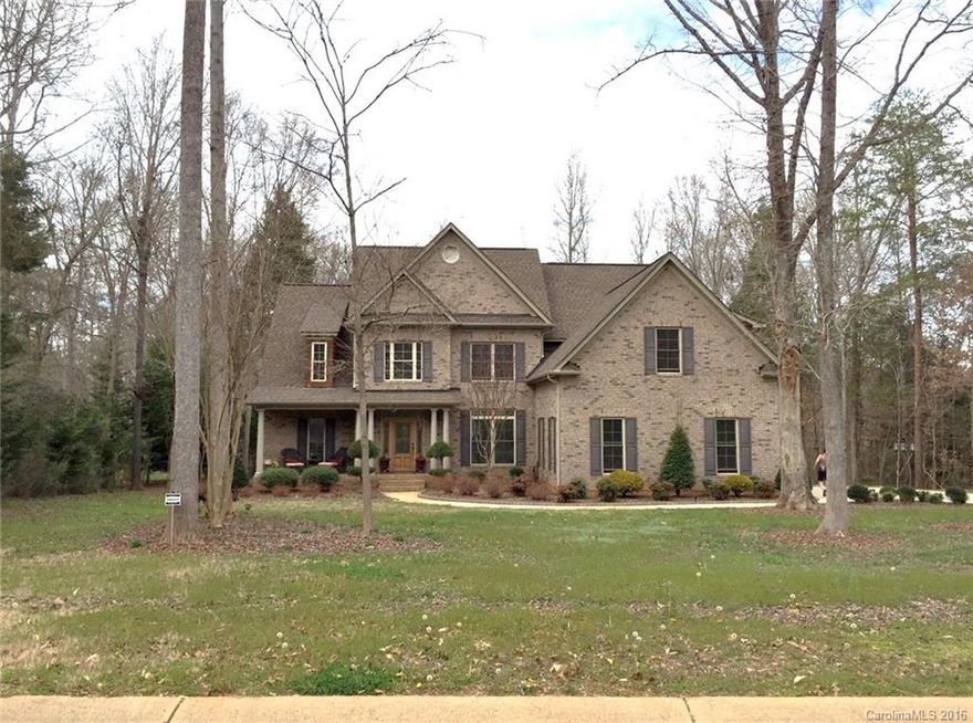 This wonderful all brick home is located on a large 1 acre pond lot. Seller says pond is stocked with fish, bring your fishing pole! This home is immaculate. Master suite & Guest suite w/ its own bath are located on the 1st floor. Kitchen is open to the breakfast area with top-of-the-line appliances, granite counter tops, and nice cabinetry. Upstairs includes 2BR, Jack n Jill bath and large bonus room. Located in award winning Clover School District. Priced below the appraised value of $485,000.
