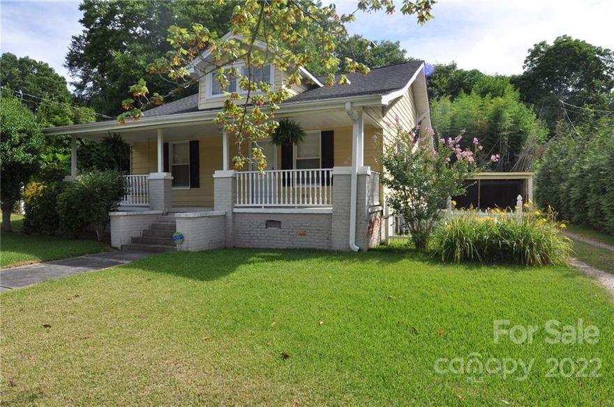 Charming 2 bedroom 1 bath bungalow.  Hardwood floors in the living room, dining room and both bedrooms.  Formal dining room.  Tub shower combo in the bathroom.  Spacious bedrooms. Home has had the electrical updated.  Rocking chair covered front porch.  Mature landscaping.  Garage/storage bldg in the back yard.