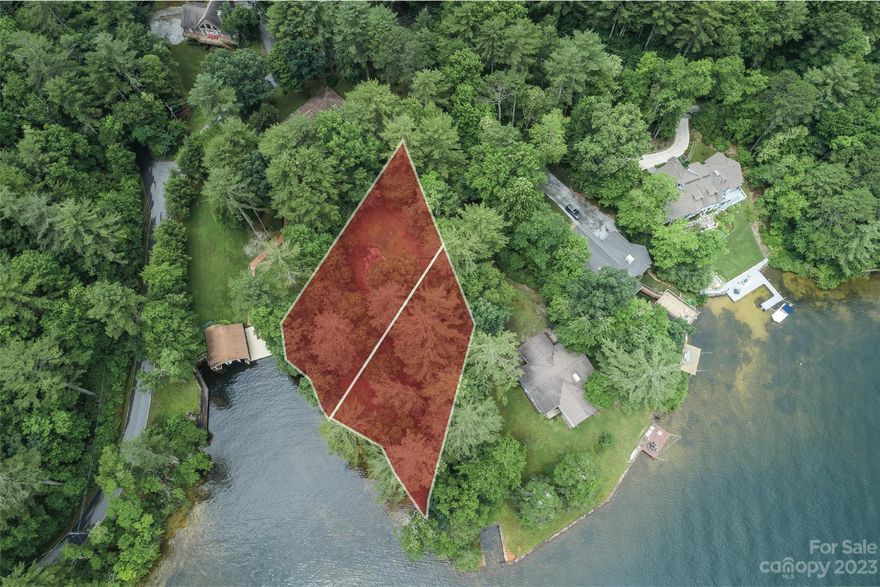 A 16&17 is an exceptional double lakefront lot opportunity in Lake Toxaway Estates. Enjoy southeastern views over Lake Toxaway with protection and privacy from native flora and fauna. The combined lots are located in a sandy bottom cove perfect for swimming, fishing and other water activities. Accessible from East Shore Drive, a low traffic road great for walking or biking. Designated area on lot A 43 for active septic system. Come and enjoy one of the finest mountain communities in North Carolina. Located a short boat ride or drive from Lake Toxaway Country Club (Lake Toxaway Country Club membership is based on application and availability).