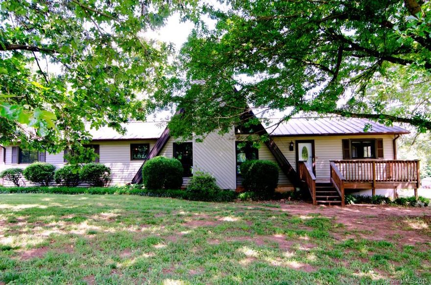 Welcome Home!Clover Schools, mins from Clover.Immaculate & updated home on 5 acres.Home features 3 bedrooms,2.5 bathrooms, Granite, SS Appl.,Metal Roof,fireplace, wood burning stove, 2car attached garage, outdoor storage, & security system. Large back deck is perfect for entertaining under the canopies that convey.The 60x30 workshop features a 735 sq. ft. finished Studio that has a kitchen, bath & laundry area. All appliances, but the refrigerator in the Studio,convey.Come take a look!