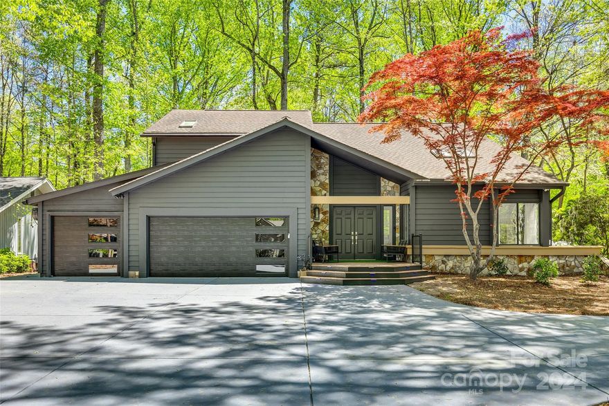 Nestled within the prestigious & amenity-rich gated community of River Hills, this WOW-factor home offers unparalleled elegance and functionality. Step inside to discover a meticulously renovated sanctuary! Entertain in style inside or out w/ the newly added massive 1,700 sq ft covered deck, complete with a huge bar & TV, perfect for hosting unforgettable gatherings. Enjoy the convenience of a rare 3 car garage + workshop area, along w/ a sprawling circular driveway providing ample parking for guests on this quiet corner lot. The newly landscaped yard w. lighting, opened up by the removal of many trees, offers a serene oasis. No expense has been spared in transforming this home into a true masterpiece. From the fresh paint and newly finished floors inside to the complete transformation outside, and the thoughtful high end finishes that redefine luxury living, this residence exudes sophistication at every turn. Completely turn key! Top awarded SC Schools! Convenient to everything!