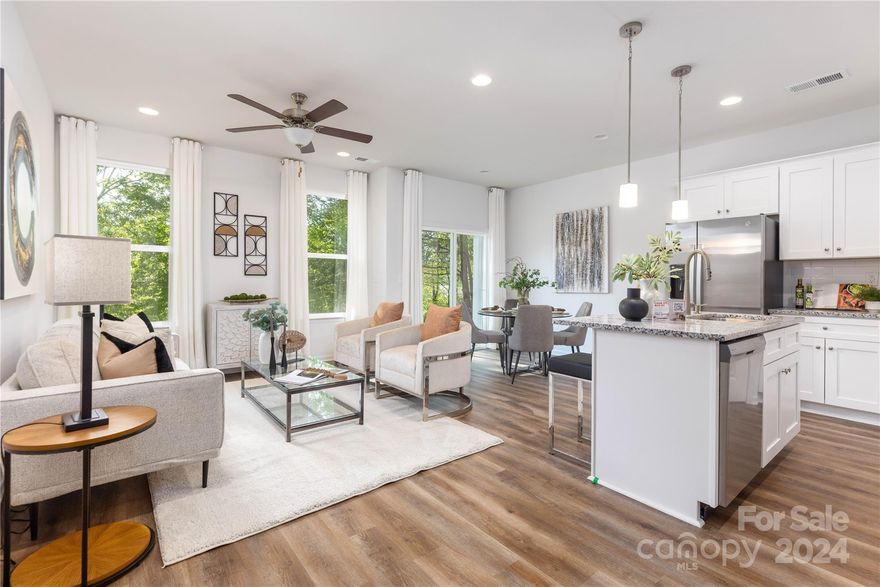 Discover the epitome of modern living with this exquisite townhome by Northway Homes. Perfectly marrying contemporary design with practical luxury. Situated in a vibrant, up-and-coming neighborhood, this residence boasts three generously sized bedrooms crafted for ultimate comfort. The primary suite is a sanctuary unto itself, featuring a luxurious ensuite bathroom and ample closet space. The open floor plan seamlessly integrates the kitchen, dining, and living areas, creating a versatile space perfect for both daily life and entertaining. Unlike many other townhomes in the area, this Northway Homes property stands out with no HOA fees. Benefit from quick access to I-485, making commutes a breeze. Enjoy proximity to beautiful greenways and the Charles T. Myers Golf Course, providing ample recreational opportunities. All the dining, shopping, and entertainment options of urban living are just minutes away.