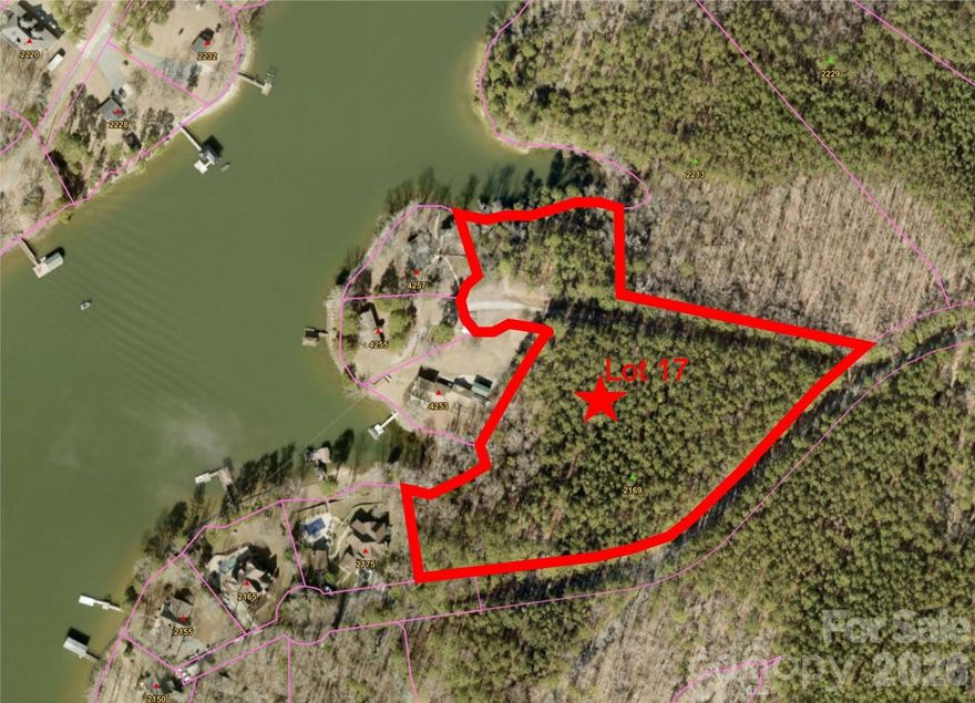If you are looking for peace and quiet while still being on the water, look no further. Located off Concord Road on Lake Wylie, this 6.10 acre waterfront lot with two potential docking locations (see exhibits showing allowable permits from Duke) is the ideal place to build on the water and still maintain your privacy. The property offers rolling topography which provides multiple locations where you can build your forever home, or just your weekend getaway, on either a slab or basement foundation depending upon your preferences. Wildlife is plentiful with numerous deer, rabbits, and water fowl surrounding the property. The Legacy Point subdivision requires all Lots to be a minimum of 5 acres and prohibits the subdivision of these Lots into smaller home sites, thereby ensuring the privacy you have today will remain in the future. In addition, Legacy Point does not have a homeowner’s association so you do not have to worry about what you can and cannot do on your own property. Legacy Point is within the York County Lake Wylie overlay district which currently has some architectural requirements for building but is under review by York County and could possibly be removed. Soil testing has been completed which did not show auger refusal through 20 feet of boring which means you will have no trouble building either a slab or basement foundation home. A septic system permit for a 5 bedroom home has been approved by SCDES which can be modified if you would like to build a bigger home or change the location of the house.