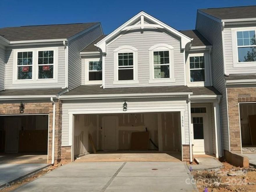 Claymore floorplan.  3 bedroom 2.5 bath townhome in the sought-after Indian Land area.  This unique home continues to stun, as it has a 2 car garage, and a huge pantry in the kitchen.  What a great use of space!  This home is at the very end of the community in a cul-de-sac, and has trees behind it.  An amazing homesite.  Enjoy the versatility of having a tub and shower in the owner's suite bath, which has a window that overlooks the treeline.  A very serene space to wake up to every morning.  Benefit from proximity to top-rated educational institutions, providing a quality learning environment for residents. with proximity to shopping and dining.  This quality residence features a spacious floor plan, modern kitchen with stainless steel appliances.  Perfect for comfortable and convenient living.  Hope to see you soon!