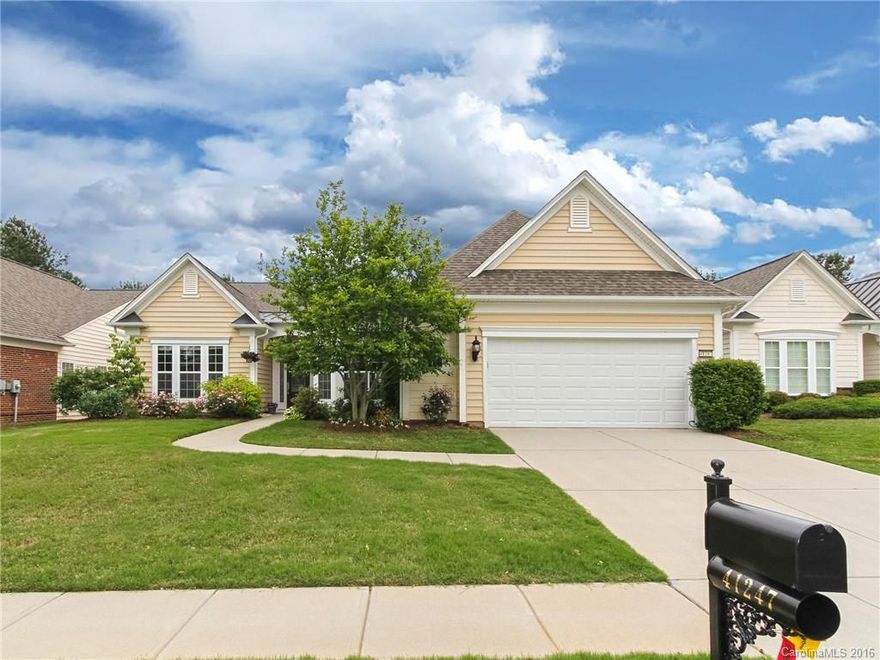 What a view!  This Cumberland Hall has a spectacular view of the lake and 17th tee.  Enjoy it from the expanded paver patio while listening to the trickle of the fountain.  The interior features granite counters, electric cooktop, tile backsplash, stainless appliances, work island and large dining area.  Master bedroom has tray ceiling, walk-in closet, double sink, separate shower & tub & acrylic block window. Come check out the community & the active adult lifestyle of Sun City Carolina Lakes.