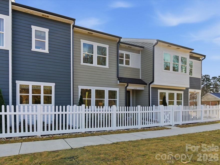 This Avett home at Ellis Townes offers well-connected living spaces, premium finishes, and generous bedrooms with ample storage throughout. A built-in drop zone adds everyday ease, while 9-foot ceilings on the first and second floors and 8-foot doorways in the primary suite enhance the open, elevated feel. The chef’s kitchen features quartz countertops, a direct vent, and a touch faucet, creating a space designed for both function and style. Outside, a fenced-in front courtyard provides a private outdoor retreat, with a community dog park just steps away. Conveniently located minutes from I-85, this home offers easy access for daily commutes and weekend adventures, making it a true launchpad for Charlotte living.