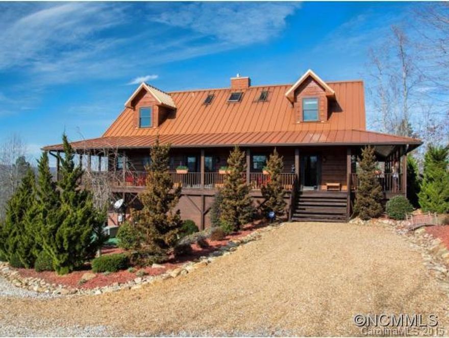 Log home perfect for vacation/second home or permanent residence. Wonderful open plan w/ pass through FP. Open & connected to the kitchen w/ granite counter tops & wormy maple cabinets. Main level living offers Mahogany floors, office/bedroom, large laundry, 1/2 bath and generous master suite which includes his and her walk-in closets, computerized walk in shower, self cleaning jetted tub & full screened in porch to enjoy the private views.