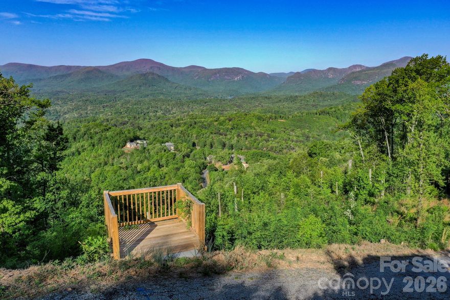 SPECTACULAR MOUNTAIN VIEWS of the Rumbling Bald Mountain range, the Hickory Nut Gorge and Chimney Rock Mountain from this 1.46 acre tract on Vista @ Bills Mountain. 3 bedroom permit on file. Enjoy the most awesome sunsets anywhere.....and enjoy peace and quiet like no other. This amazing view lot is offered at $195,000 and is 10 minutes from beautiful Lake Lure, NC. You have to see it and feel it to really appreciate it. Call today for your personal tour! Vista is a private, gated community with clubhouse, swimming pool and tennis court for your leisure.